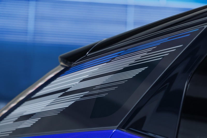 Close-up of the Modern Pattern on the 2026 OPTIQ-V Rear Quarter Glass | Wheeler Chevrolet Cadillac in Yuba City CA